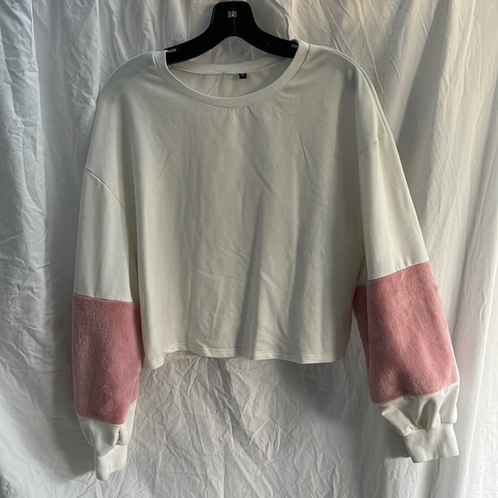 White top with pink fuzzy sleeves